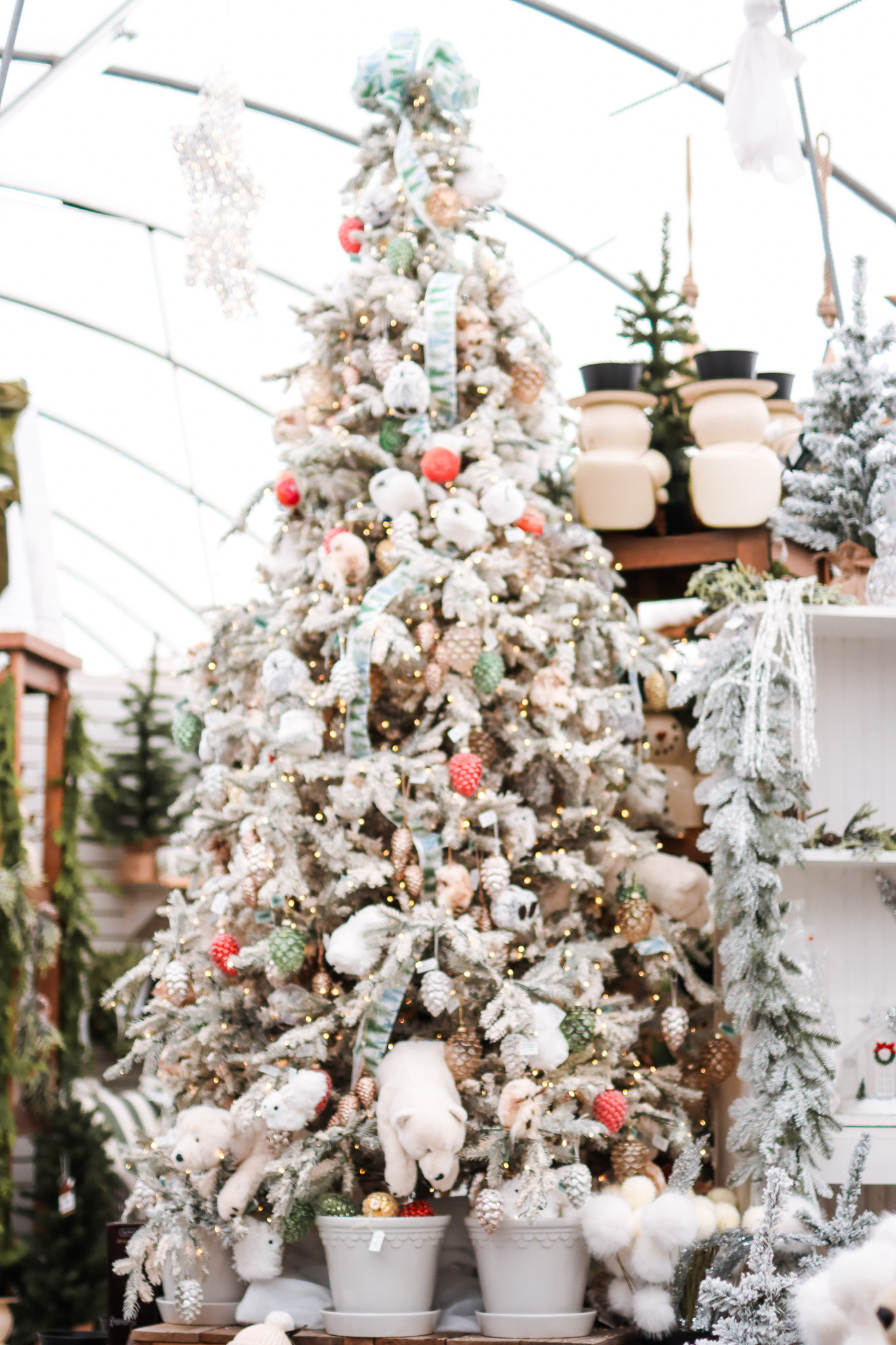 Flocked decorated lifelike christmas tree
