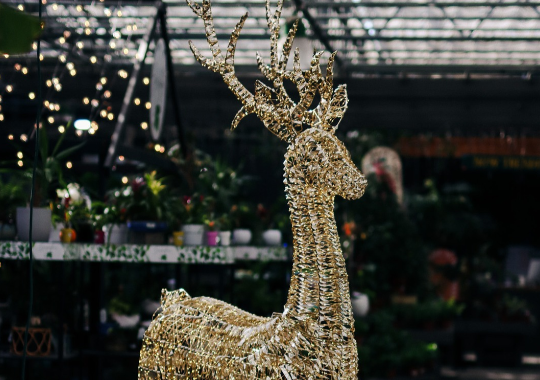 golden outdoor deer figurine